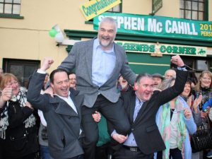 1485029390042-jpg-home_is_the_hero___donegal_person_of_the_year_2016_raised_shoulder_high_in_ardara