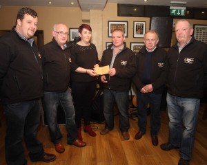 Paula Keeney receives a cheque on behalf of Donegal Down Syndrome for E3250 from Midwest Donegal Vintage Club members, Daniel Moy, William Payne, Aaron O'Shea, Eddie Boyd and Brendan Byrne.(jmac.ie)