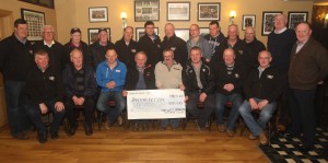 Midwest Donegal vintage Club members pictured with their cheque for E3,135 for Tractor Action, proceeds from their Vintage rally which will go towards  the victims of Flood Damage in the Country. (jmac.ie)